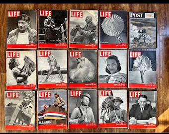 May include: A collection of vintage LIFE magazines and one POST magazine, featuring various black and white photographs on the covers. The magazines have red borders and the word "LIFE" in white letters. The covers depict portraits, scenes, and illustrations.