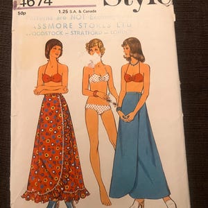 May include: Vintage sewing pattern titled "Style" with the number 4674. The pattern features illustrations of three women in swimwear and skirts. The bust size is 91 cm. The pattern is from Assmore Stores Ltd.