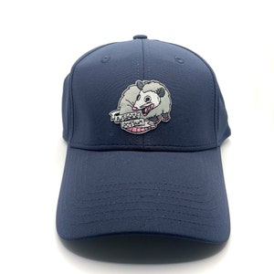 May include: A dark blue baseball cap with an embroidered patch of a possum with the text "Awesome Possum".