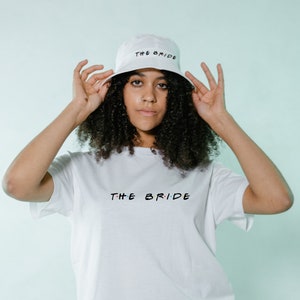 Trendy &#39;The Bride&#39; White Bucket Hat - Friends Font Bridal Statement Piece for Trendsetting Brides