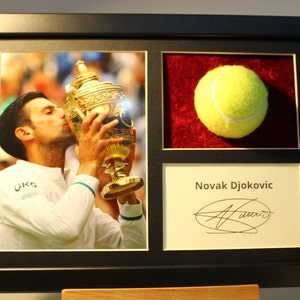 NOVAK DJOKOVIC AUTOGRAPH in elegant display with tennis ball + frame A4/ Sports goat. Memorabilia/ Memorial frame.