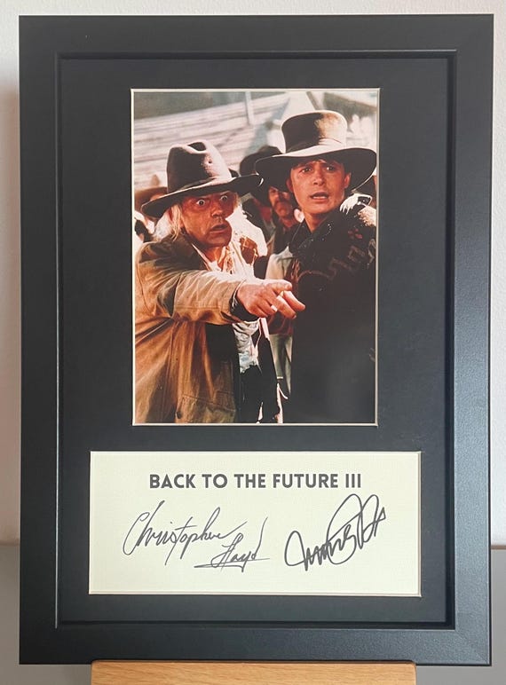 クリストファー・ロイドとマイケル・J・フォックスのサイン入りA4