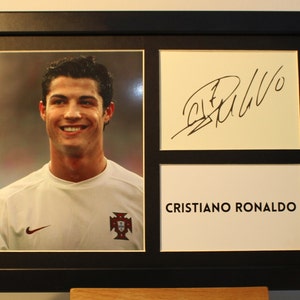 CRISTIANO RONALDO AUTOGRAMM gerahmt A4 / signiertes Display - Erinnerungsstücke. Der junge Ronaldo
