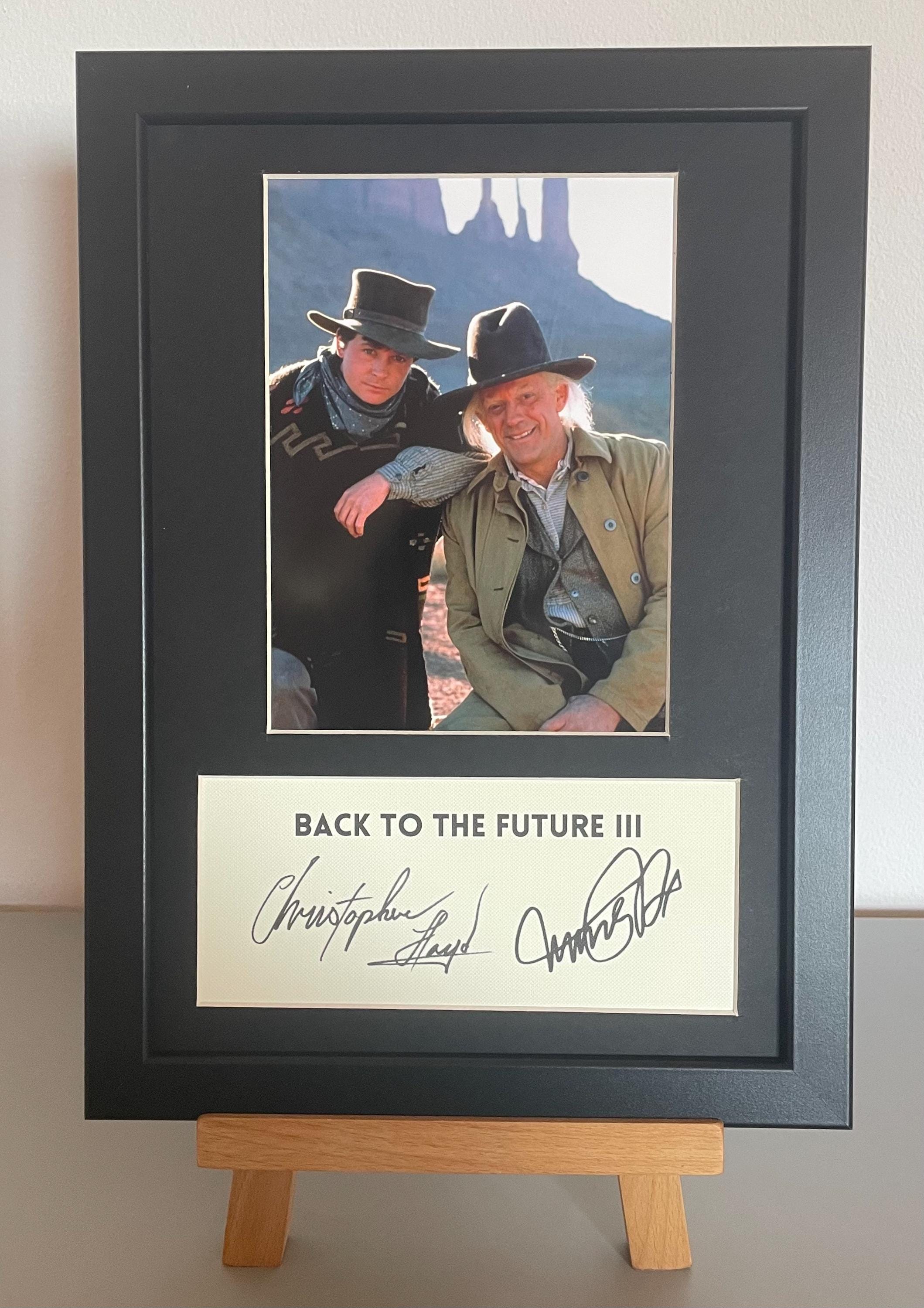 クリストファー・ロイドとマイケル・J・フォックスのサイン入りA4