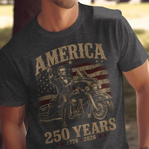 Abraham Lincoln on motorcycle with "America 250 Years" text and US flag.