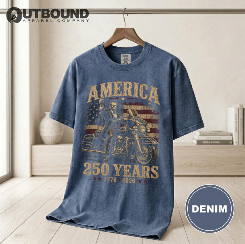 Denim t-shirt with American flag, motorcycle, and "America 250 Years" text.
