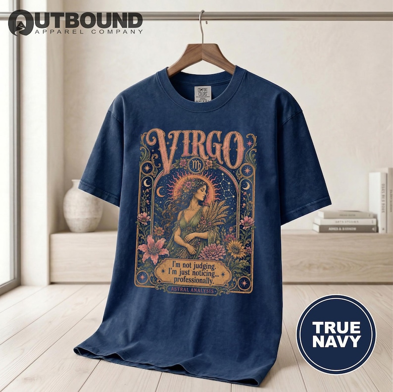 Dark blue t-shirt with "Virgo" and astrological graphic and text.