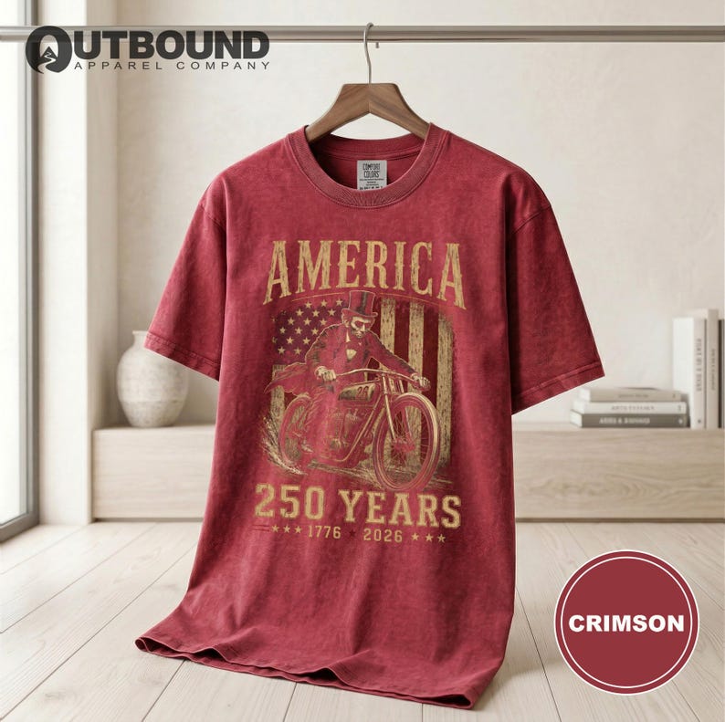 Crimson t-shirt with America 250 Years and bicentennial dates graphic.