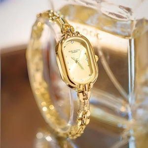Dainty watch price shop