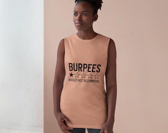 May include: A sleeveless peach-colored tank top with the word "BURPEES" in black block letters, along with a rating of one star and the phrase "WOULD NOT RECOMMEND". The shirt is made of a soft material.