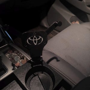 2005-2015 Toyota Tacoma center console  tray/phone holder.  with hidden coin holder