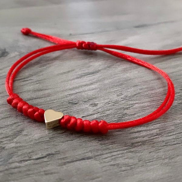 Bracelet Coeur doré porte bonheur fil rouge  bouddhiste