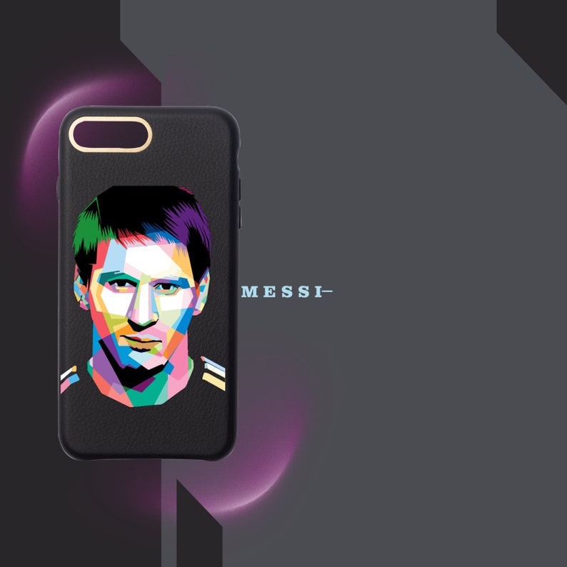 May include: A black leather phone case with a colorful pop art portrait of Lionel Messi. The text "MESSI" is printed on the case.