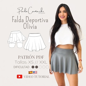 May include: A woman wearing a gray athletic skirt and a white crop top. The image includes a sketch of the skirt and text that reads "Falda Deportiva Olivia" and "PDF Pattern". The difficulty level is indicated by black circles.