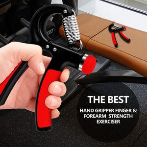Puede incluir: Agarre de mano negro y rojo con un resorte plateado. Se muestra el texto "THE BEST HAND GRIPPER FINGER & FOREARM STRENGTH EXERCISER". Un segundo agarre es visible en el fondo.