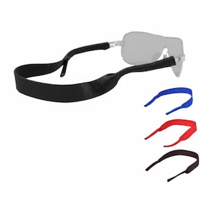 May include: A set of four adjustable eyewear retainer straps in black, blue, red, and dark brown. Each strap features a flexible, fabric-covered design that slides onto the temple tips of eyeglasses to secure them in place during active movement.
