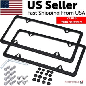 May include: Two black license plate frames with mounting hardware. The frames are rectangular with rounded corners and pre-drilled holes. The image includes screws, screw caps, and a hex key. Text on the image reads "US Seller" and "2 PACK With Hardware."