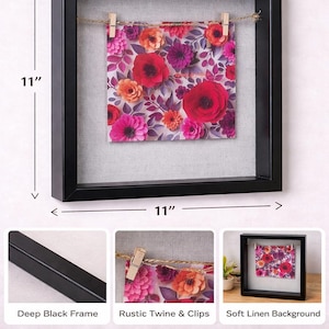 May include: Square shadow box frame, 11x11 inches, with a deep black frame, linen background, and rustic twine with clips. The frame holds a floral print with red, pink, and orange flowers. The text "Square Shadow Box Frame" is at the top.