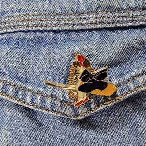 Witch with a broom Enamel Pin – Cartoon Movie -Inspired Enamel Pin – Cute & Collectible Character Badge