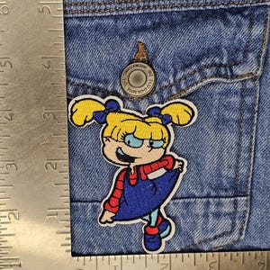 Angelica 90s Cartoon Iron-On Patch – Embroidered Retro Badge | Nostalgic Fashion Accessory | Jacket & Backpack Patch