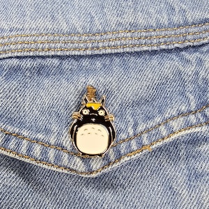 M. Neighbor Tt Enamel Pin – Cartoon Movie -Inspired Enamel Pin – Cute & Collectible Character Badge