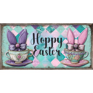 May include: A wooden sign with a turquoise, pink, and purple diamond pattern background. Two teacups with bunny ears and the words "Hoppy Easter" are featured. The teacups are decorated with floral designs and sit on matching saucers.