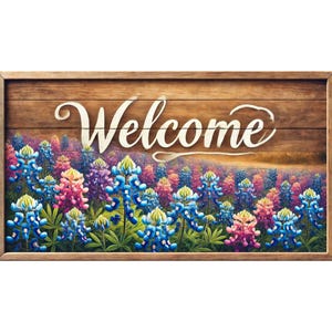 May include: A wooden sign with the word "Welcome" painted in white on a brown wooden background. The sign is decorated with a field of bluebonnets, a type of wildflower native to Texas.