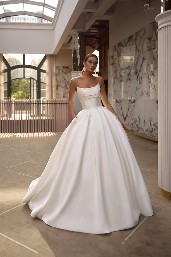 elegant fitted wedding dresses Elegant Off-shoulder White Bridal Gown With Delicate Lace, Timeless Column Wedding Dress With Corset Back and Long Lace Sleeves A-line Dress