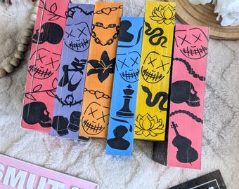 Sprayed edge editions of the Legacy of Gods series by Rina Kent | paperback painted edges