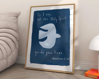 Puede incluir: Una impresión enmarcada azul y blanca con una paloma blanca y el texto "So I say. let the Holy Spirit guide your lives. -Galatians 5:16"