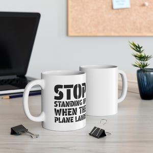 Funny Aviation Mug: Stop Standing Up Airplane Coffee Cup