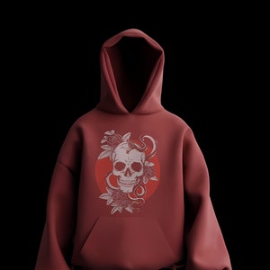 May include: A maroon hoodie with a graphic print of a skull with roses and a snake. The skull is white and the roses are pink.