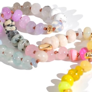 Candy Colored Long Beaded Gem Necklace featuring neon colored rainbow gemstones and opal rainbow beads. 
 It is a beautiful Boho Chic Statement Necklace for the Summer in colors of bright neon pinks , purples, oranges, pastels and yellows.