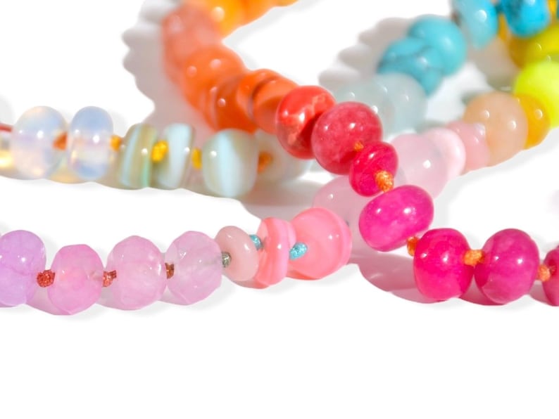 Candy Colored Long Beaded Gem Necklace featuring neon colored rainbow gemstones opal rainbow beads. 
 It is a beautiful Boho Chic Statement Necklace for the Summer in colors of bright neon pinks , purples, oranges, turquoise and yellows.