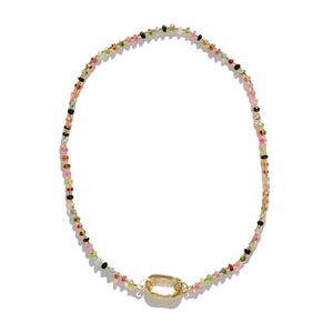 May include: A colorful beaded necklace with a gold clasp. The beads are small and varied in color, including pink, green, blue, and black.
