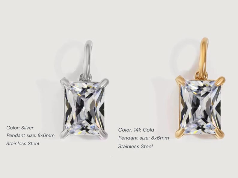 Gold diamond crystal charm displayed on a white background, each featuring a baguette cut The clear faceted stones shimmer in the light, framed in gold settings with looped bails for attaching to necklaces or bracelets. Elegant minimalist photo showing jewelry-making pendants available in both gold and silver options.  Perfect for diy jewelry to use as add-on charms for any charm necklace or charm bracelet.