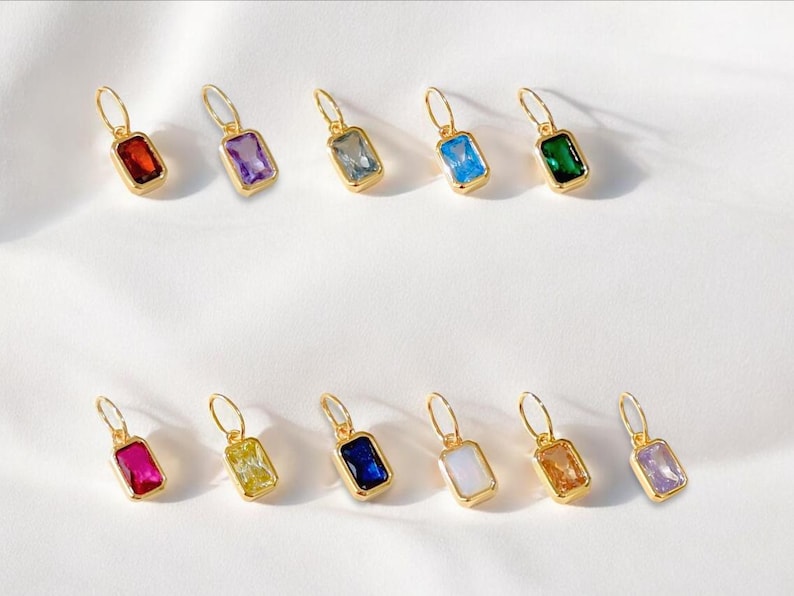 Gold birthstone charms featuring bezel-set gemstones for each month, designed for custom necklaces and bracelets.  14k gold vermeil 925 Sterling silver