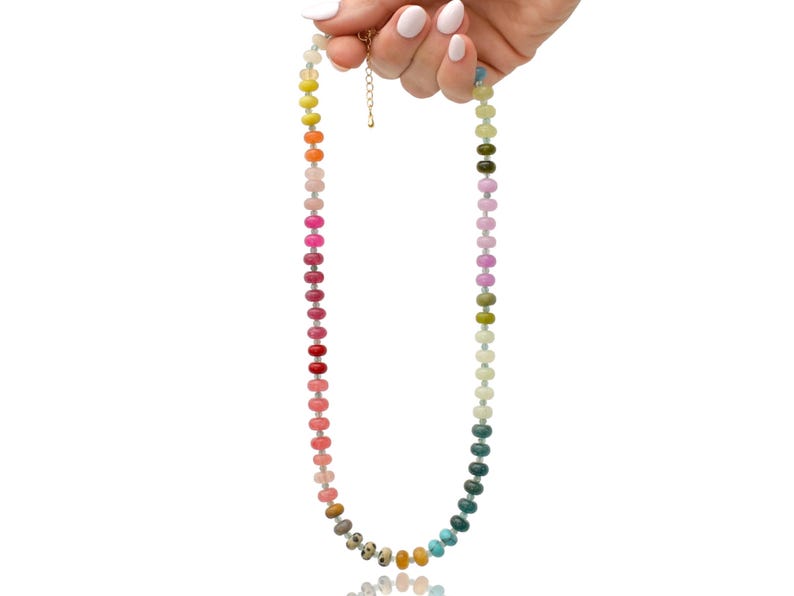 A rainbow multi-gemstone necklace from natural semi precious gemstones and apatite beads.  This necklace is sure to add a pop of color to any outfit
