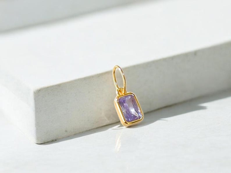 Gold birthstone charms featuring bezel-set gemstones for each month, designed for custom necklaces and bracelets.  14k gold vermeil 925 Sterling silver