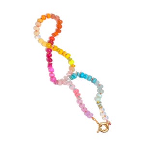 Candy Colored Long Beaded Gem Necklace featuring neon colored rainbow gemstones opal rainbow beads. 
 It is a beautiful Boho Chic Statement Necklace for the Summer in colors of bright neon pinks , purples, oranges, turquoise and yellows.