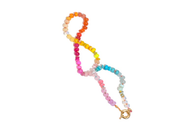 Candy Colored Long Beaded Gem Necklace featuring neon colored rainbow gemstones opal rainbow beads. 
 It is a beautiful Boho Chic Statement Necklace for the Summer in colors of bright neon pinks , purples, oranges, turquoise and yellows.