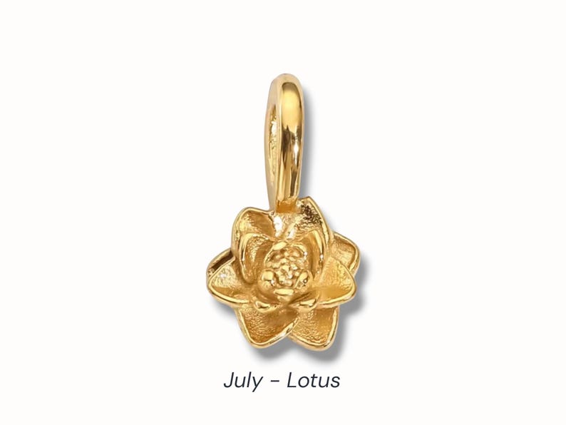 Gold birth flower charm representing each month, featuring a delicate embossed floral design on a round gold pendant — a personalized jewelry gift for her.