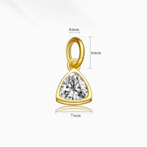 14k gold vermeil birthstone charms in a triangular bezel setting, each featuring a different colored gemstone, arranged neatly on a white background. Designed for necklaces and bracelets.