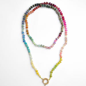 A rainbow multi-gemstone necklace that is handknotted   & handcrafted.  Made from natural semi precious gemstones.  This necklace is sure to add a pop of color to any outfit