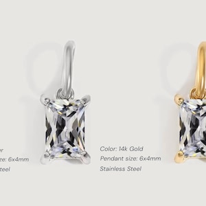 Gold diamond crystal charm displayed on a white background, each featuring a baguette cut The clear faceted stones shimmer in the light, framed in gold settings with looped bails for attaching to necklaces or bracelets. Elegant minimalist photo showing jewelry-making pendants available in both gold and silver options.  Perfect for diy jewelry to use as add-on charms for any charm necklace or charm bracelet.
