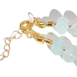 Light blue aquamarine Gem Necklace hand made with silver and gold spacer beads. 
 It is a beautiful Boho Chic Statement Necklace for the Summer in colors of soft  blue.