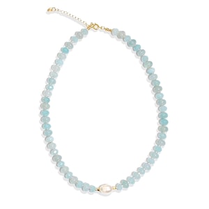 Light blue aquamarine Gem Necklace hand made with silver and gold spacer beads. 
 It is a beautiful Boho Chic Statement Necklace for the Summer in colors of soft  blue.