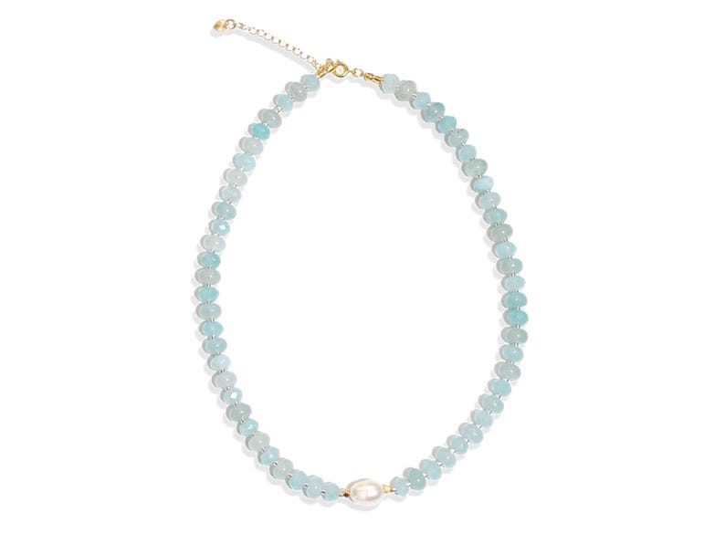 Light blue aquamarine Gem Necklace hand made with silver and gold spacer beads. 
 It is a beautiful Boho Chic Statement Necklace for the Summer in colors of soft  blue.