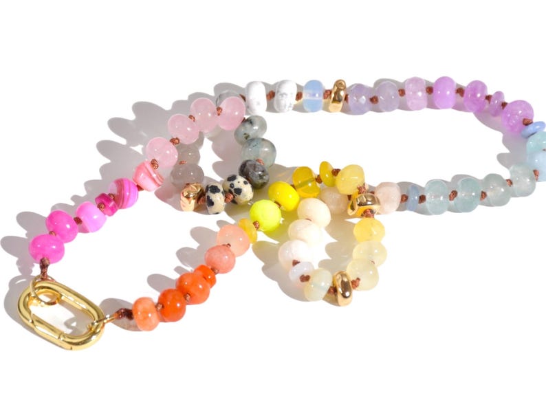 Candy Colored Long Beaded Gem Necklace featuring neon colored rainbow gemstones and opal rainbow beads. 
 It is a beautiful Boho Chic Statement Necklace for the Summer in colors of bright neon pinks , purples, oranges, pastels and yellows.