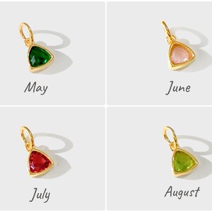 14k gold vermeil birthstone charms in a triangular bezel setting, each featuring a different colored gemstone, arranged neatly on a white background. Designed for necklaces and bracelets.